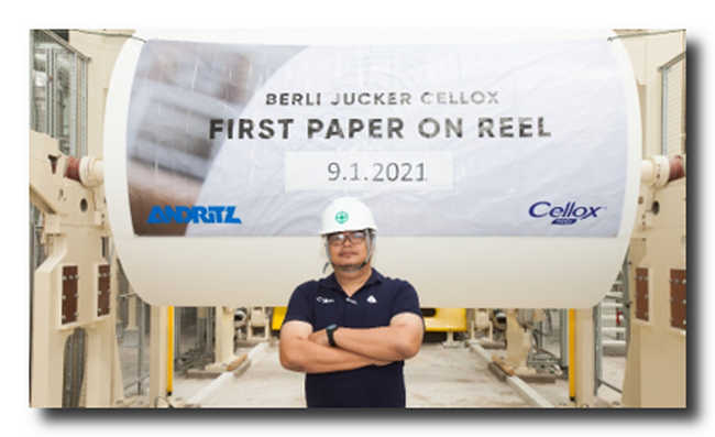 Pisit Samatha, Associate Director of Manufacturing at  Berli Jucker Cellox, with the first TM5 paper on reel.